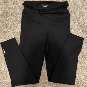 7/8 length black leggings with ruffle waist. Worn once, very soft.
